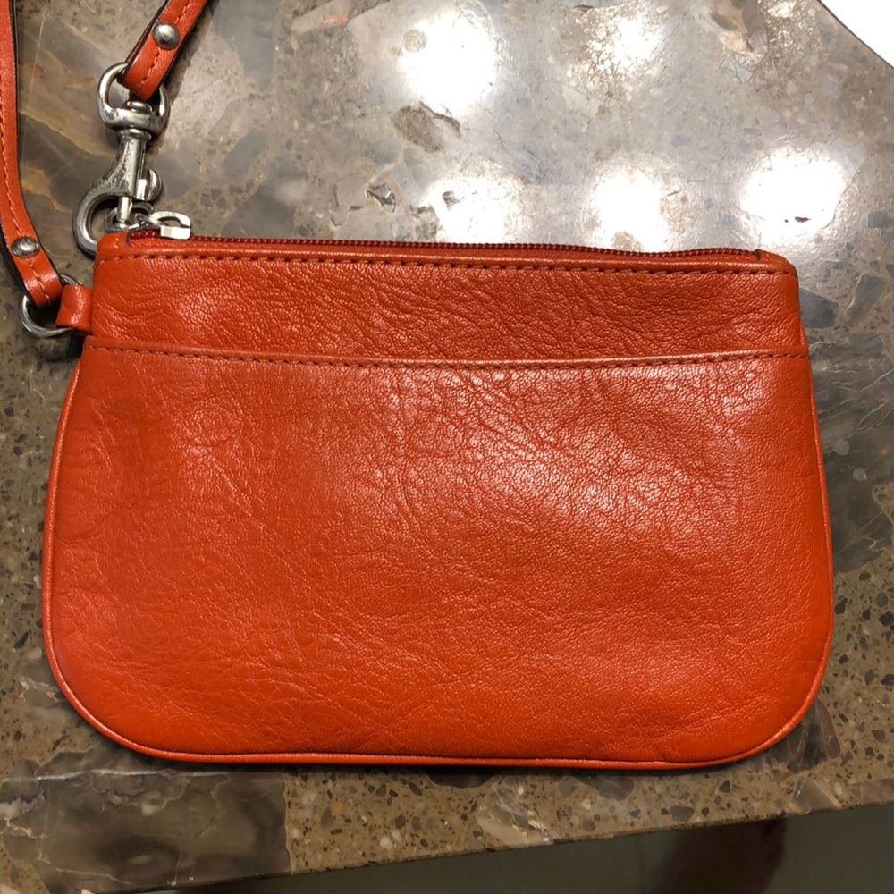 Pumpkin spice Coach wristlet